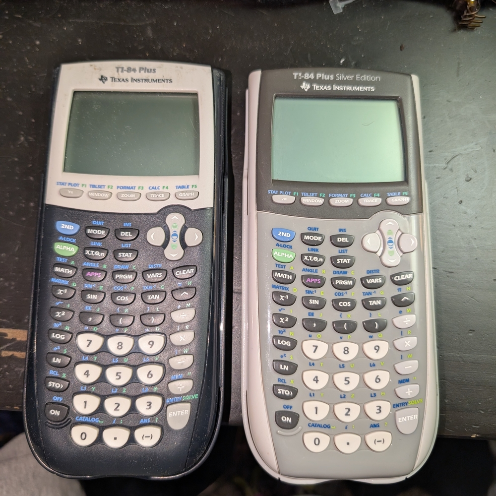Texas Instruments TI-84 Plus Black and Silver Calculators